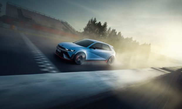 The all-electric Hyundai IONIQ 5 N driving on a racetrack.